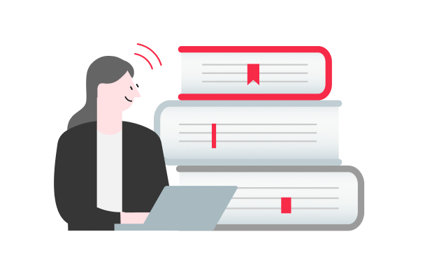 ノートパソコンで業界レポートの更新情報をチェックしているビジネスパーソン